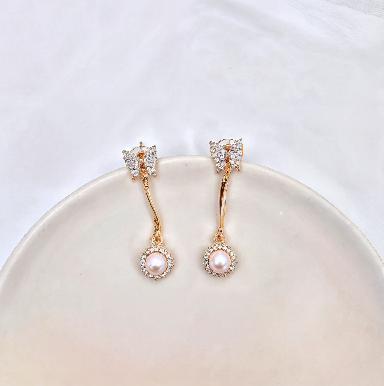 Dangling CZ Studded Pearl Butterfly -Golden